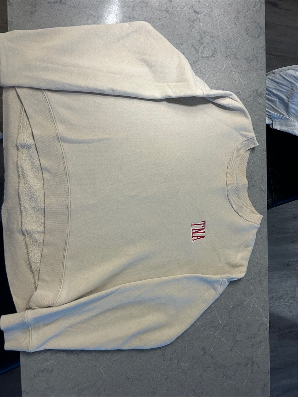 TNA Cream Crewneck Sweatshirt with Red Logo